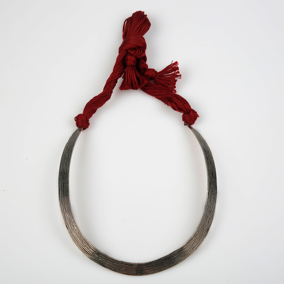 Antique Silver Torque Necklace with Maroon Thread Tie
