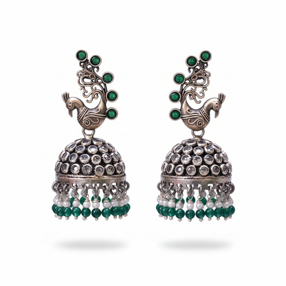Krishnacrafts Sterling Silver Handcrafted Peacock Jhumka with Green Bead Drops.