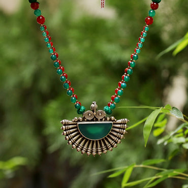 Krishnacrafts green stone pendent with onex mala
